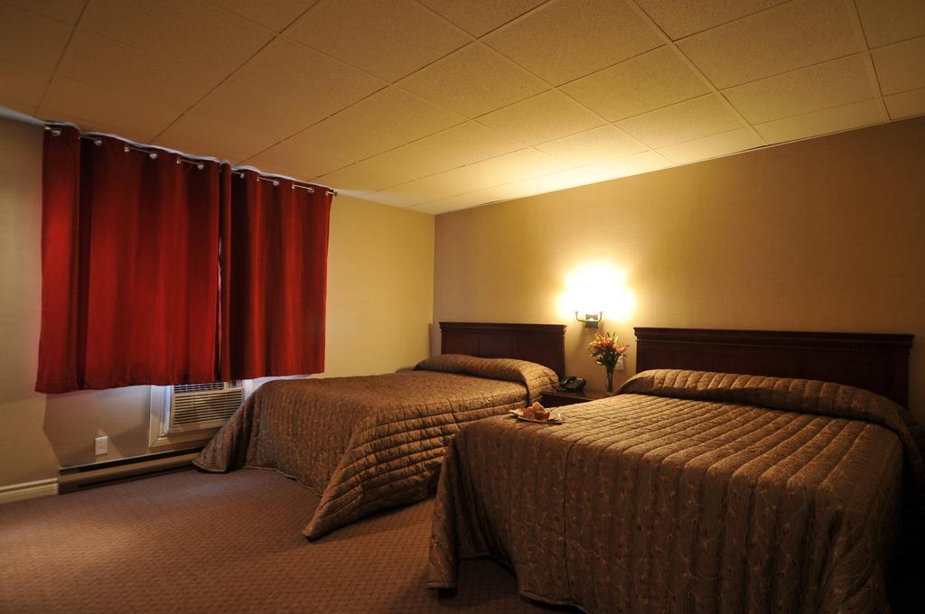 Motel Capri Et Suites Репантіньї Екстер'єр фото