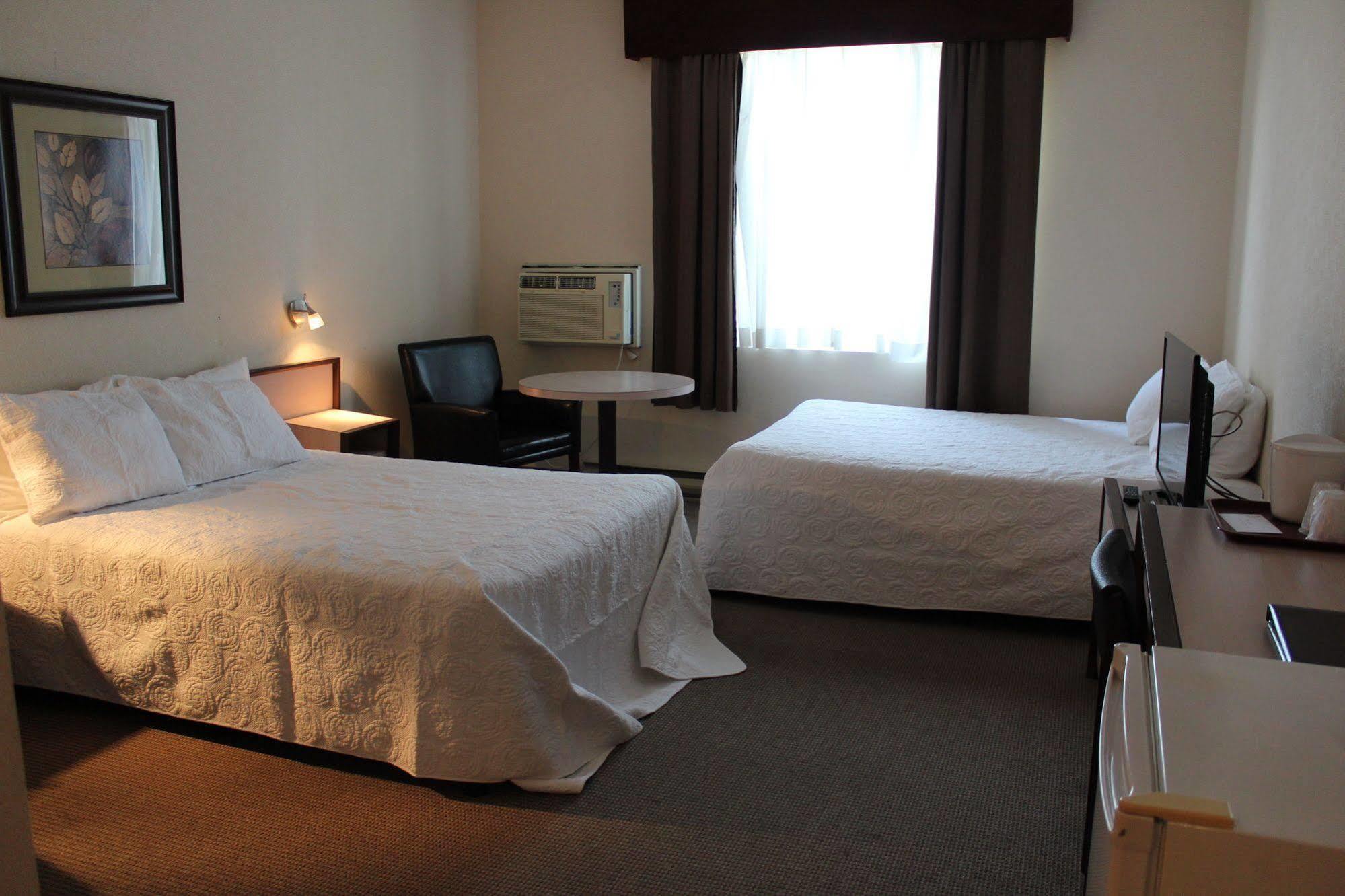 Motel Capri Et Suites Репантіньї Екстер'єр фото